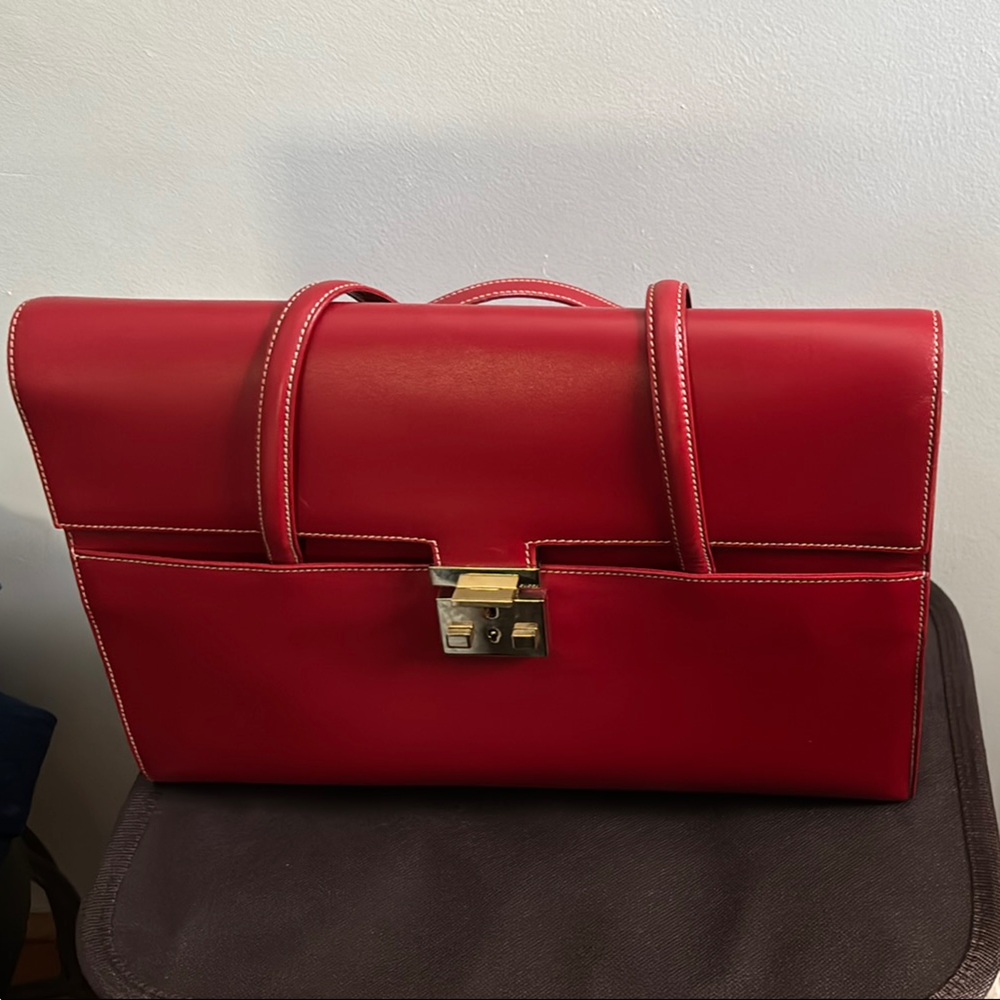 Gucci Red Clutch with Gold Clasp and Structured Design